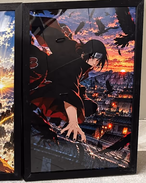 Black wooden frame holding an anime-style poster of a dark-haired figure in a black and red cloak crouched on a rooftop among crows