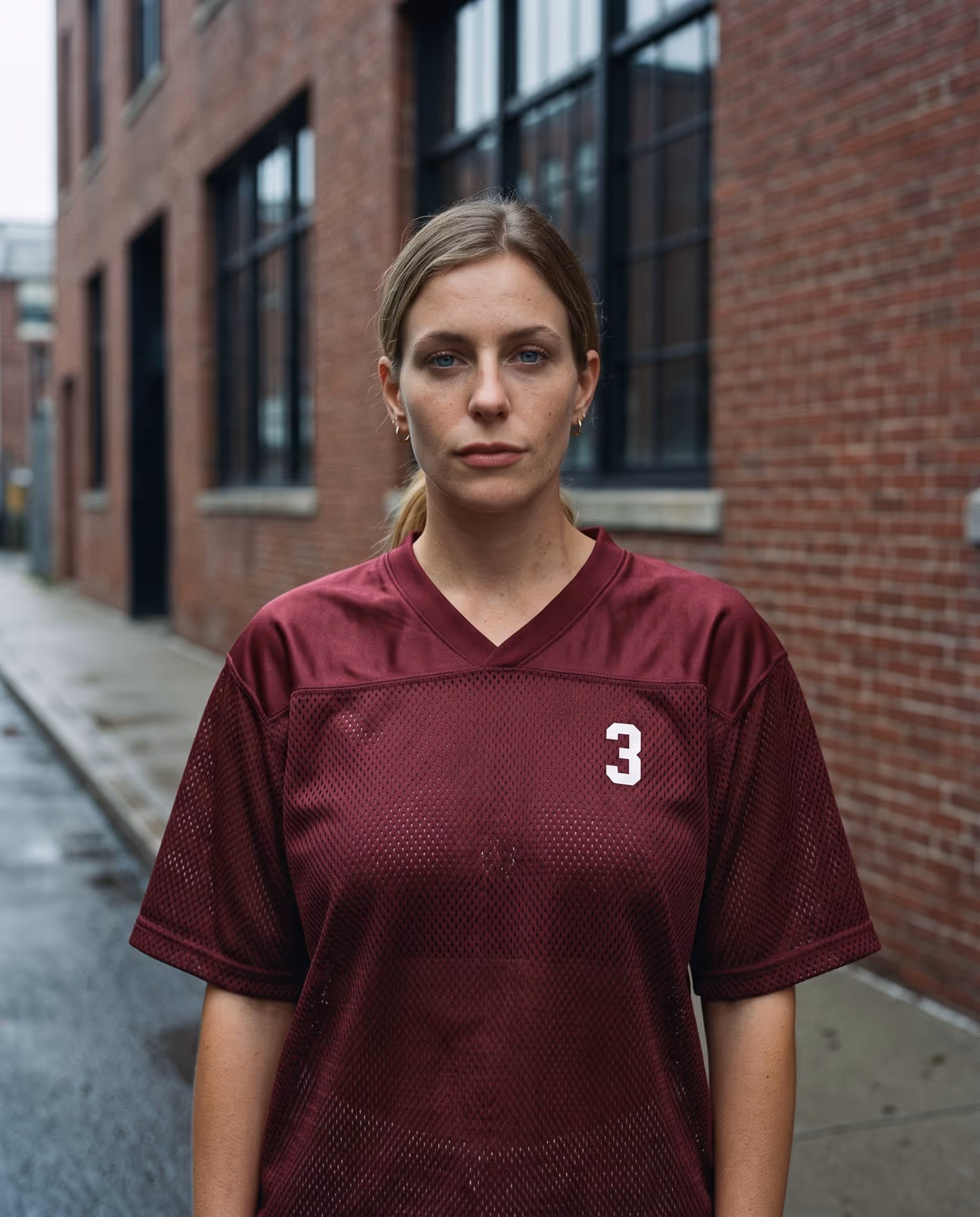 Maroon jersey with a single small white number 3 on the chest