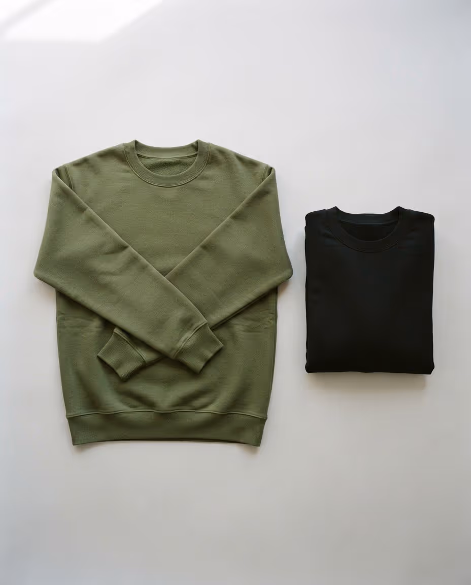 Olive green and black crewneck sweatshirt blanks laid flat
